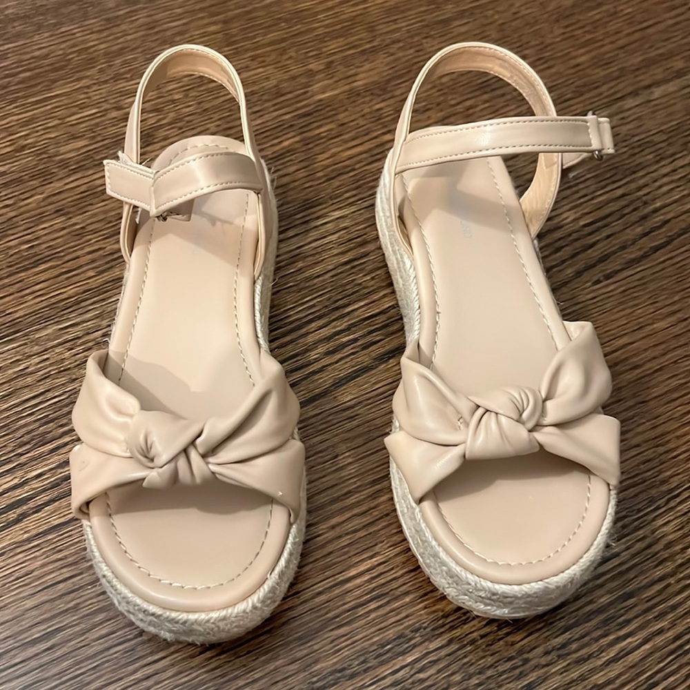 Girls size 4 sandals. Worn only a couple of times.